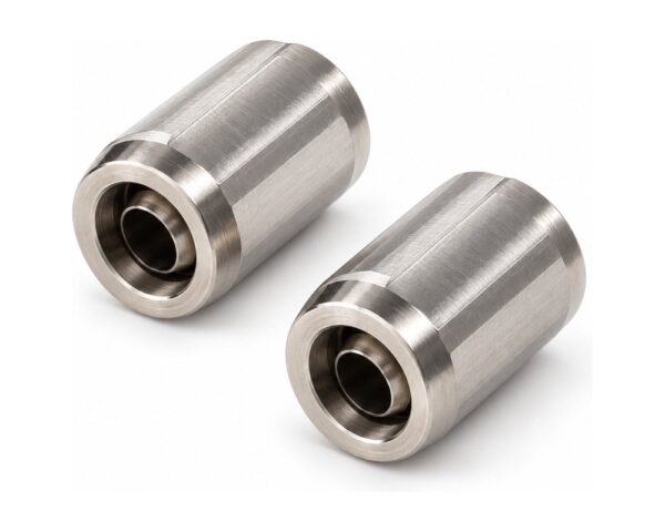 Stainless steel and polymer nuts and ferrules for sealing tubing into instrument ports.